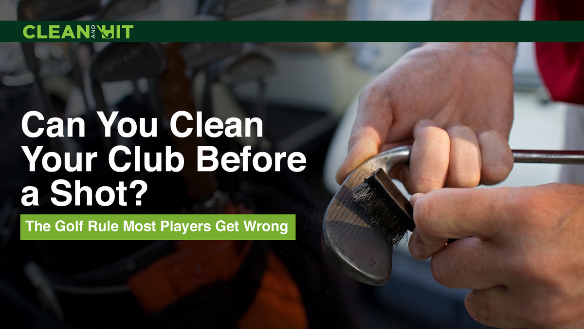 Golfer's hands scrubbing the grooves of a wedge with a wire-bristle brush, with a golf bag in the background
